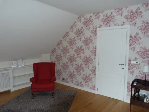 Behangwerken in een woning in Herent